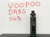 A vape kit in front of a white board signifying the VOOPOO Drag Review